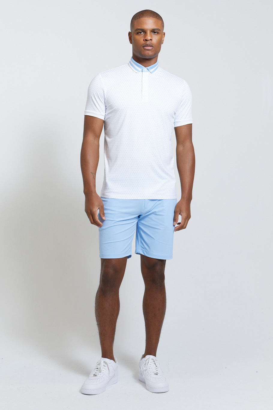 Image of the carver polo in bright white ss23
