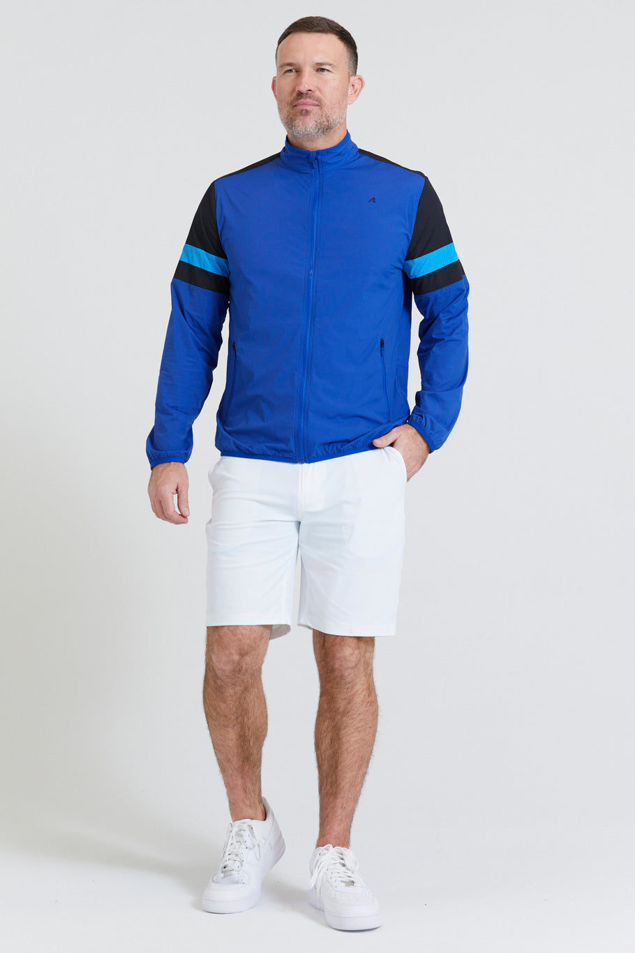 Image of the elston windbreaker in olympic ss23